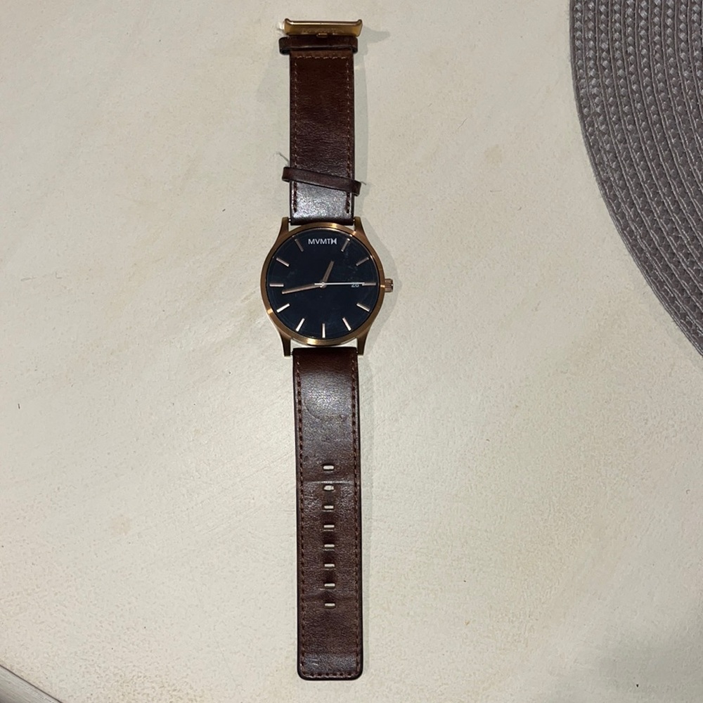 Brown Leather band, black/gold face MVMT men’s watch!